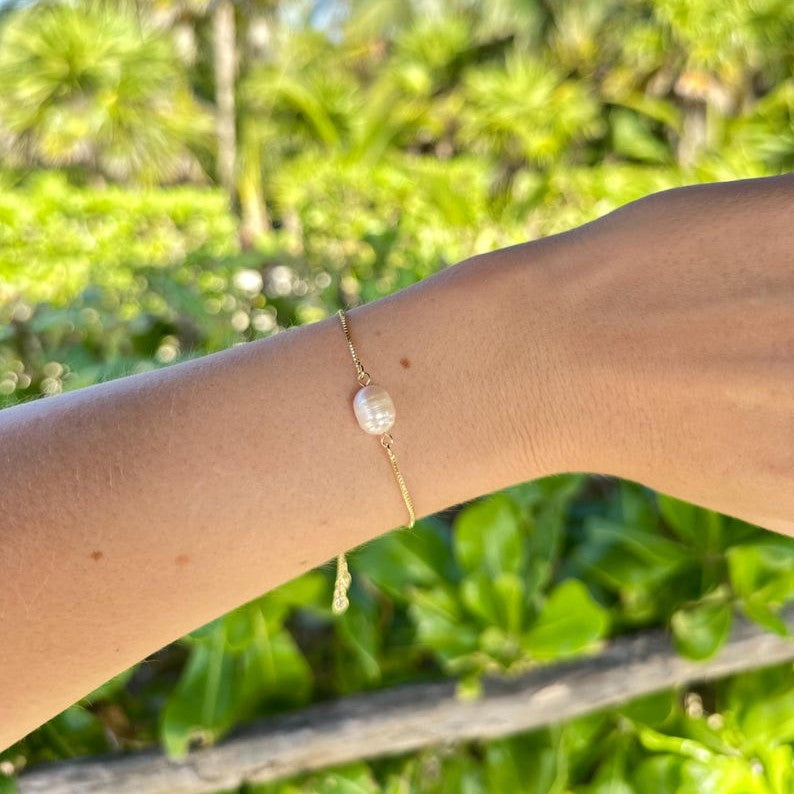 Pulsera ajustable con perla
