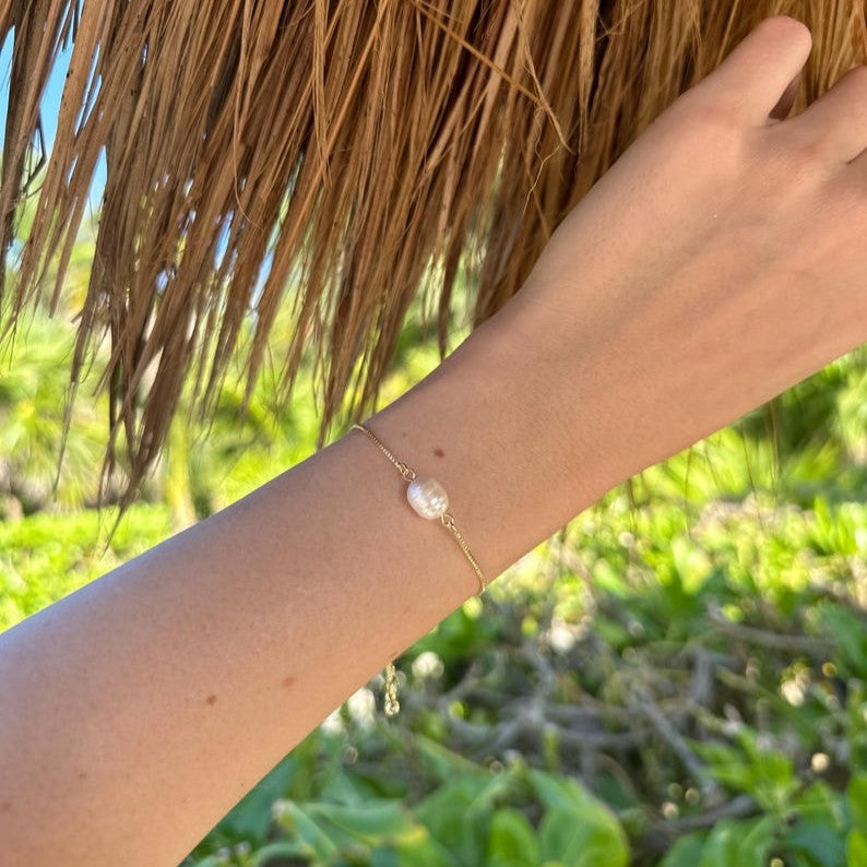 Pulsera ajustable con perla
