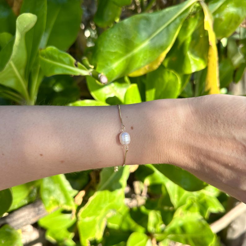 Pulsera ajustable con perla