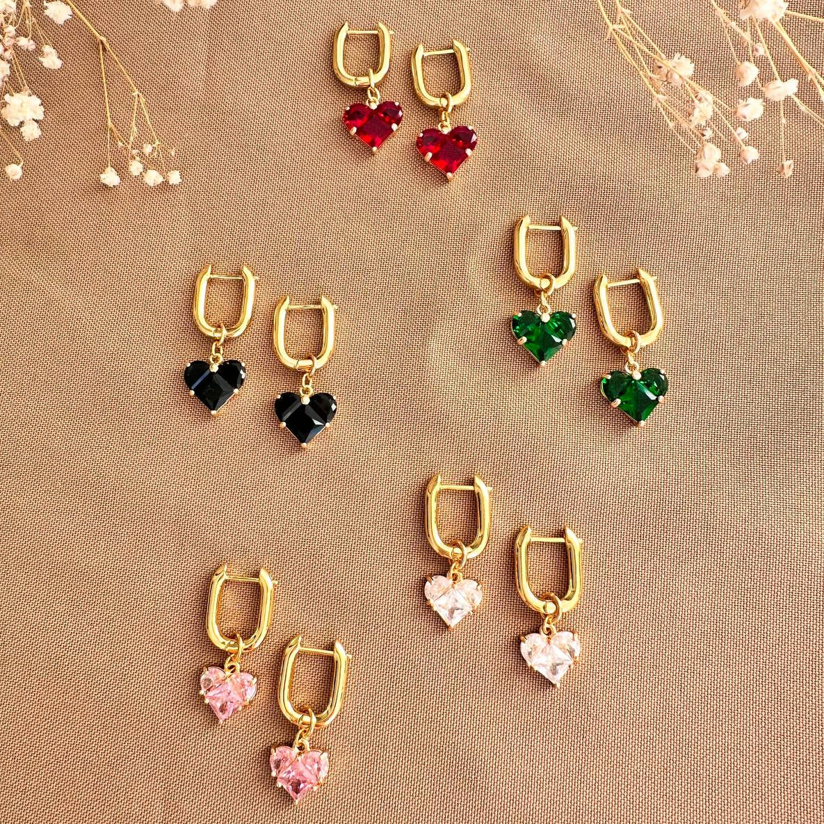 Aretes transformables corazones rosas