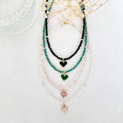 Collar con corazón verde