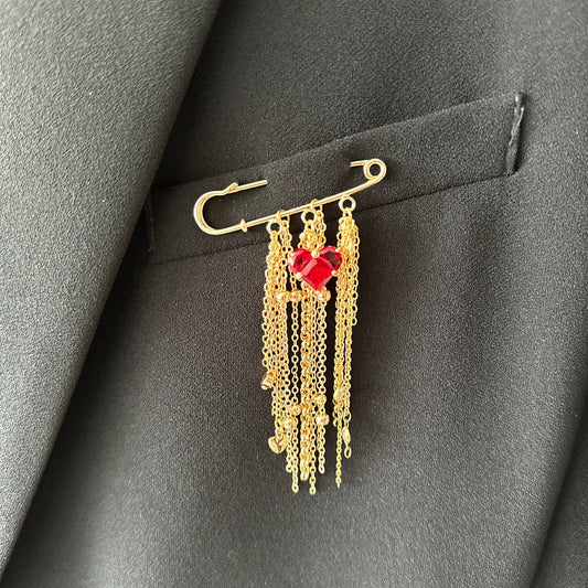Broche de corazón con cadenitas de acero inoxidable