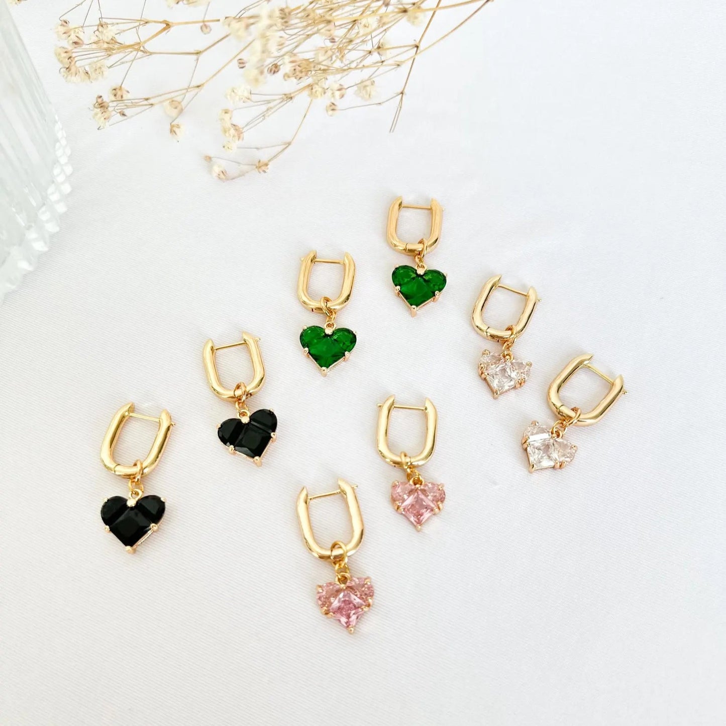 Aretes transformables corazones rosas
