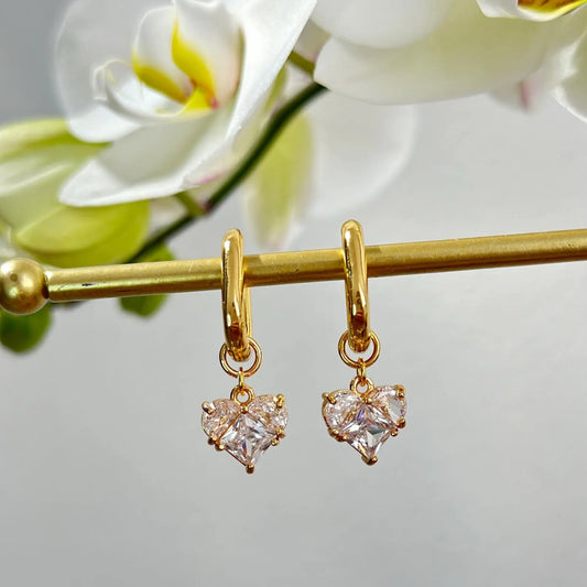 Aretes transformables corazones blancos