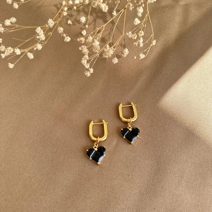 Aretes transformables corazones negros